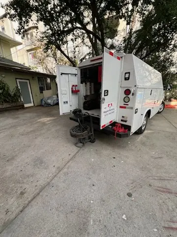 Magnet Plumbing service vehicle on-site for Grease Trap Cleaning in Pasadena